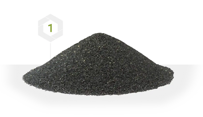 Pile of dark, granular material.